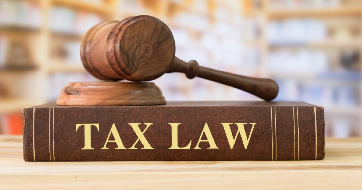 A book titled “Tax Law” and a gavel