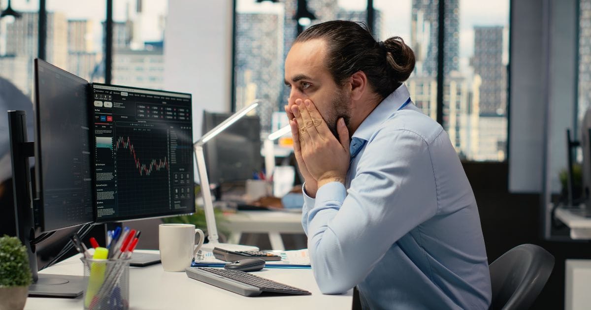 An investor panicking over lower stock prices